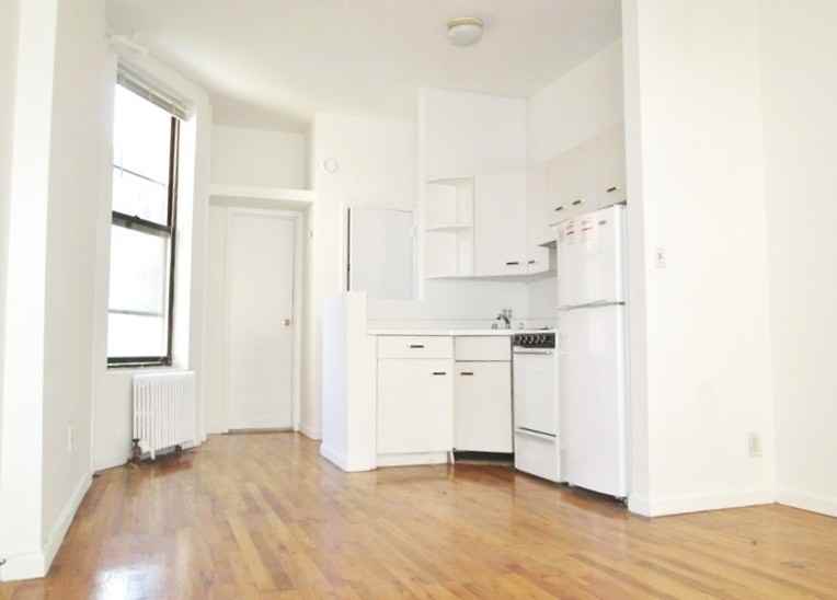 247 E 62nd St - Photo 3 of 4