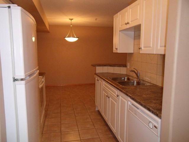 WOODLAND MANOR - Photo 2 of 10