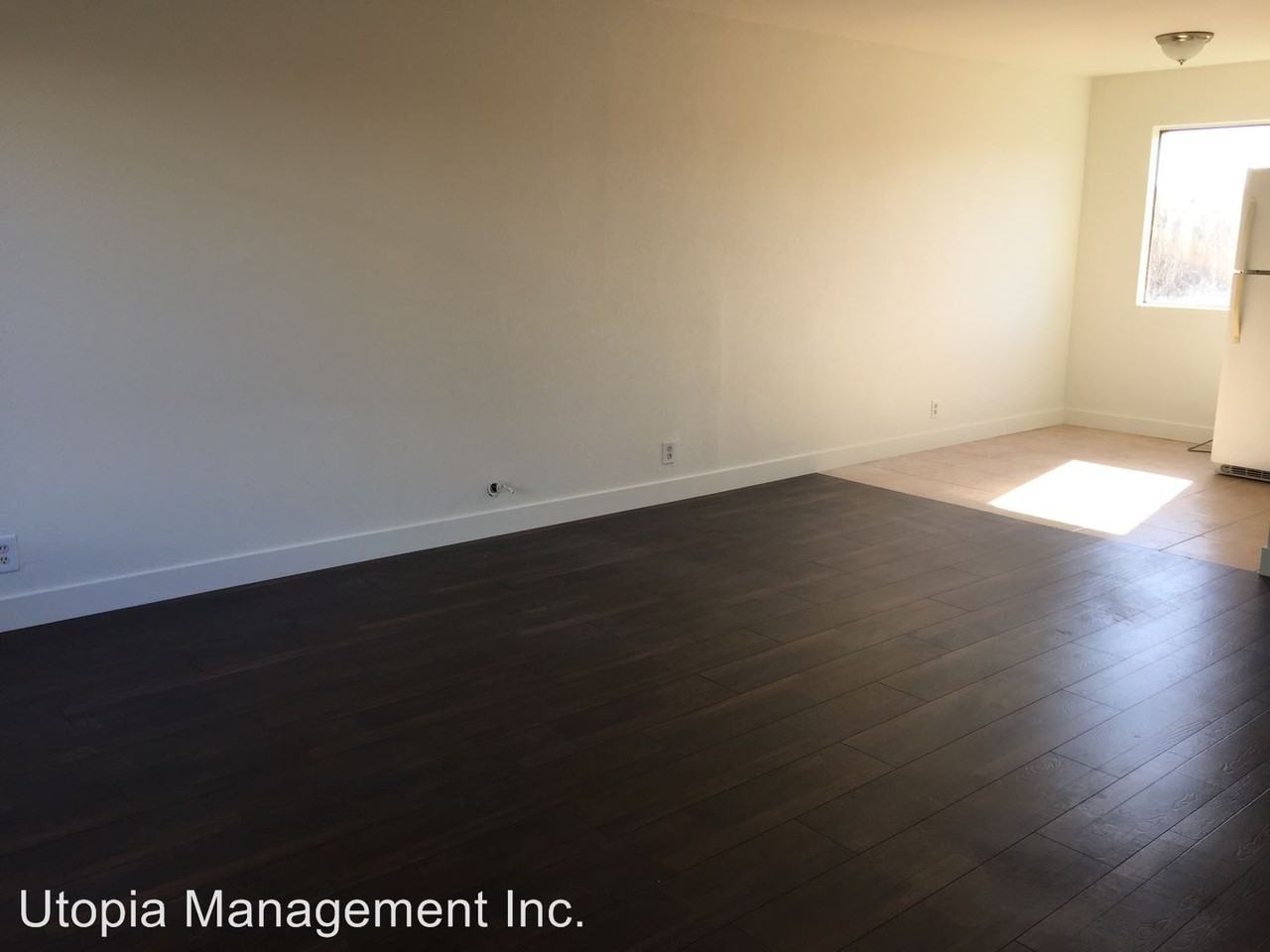 1407 - 1411 E 7th St - Photo 2 of 9