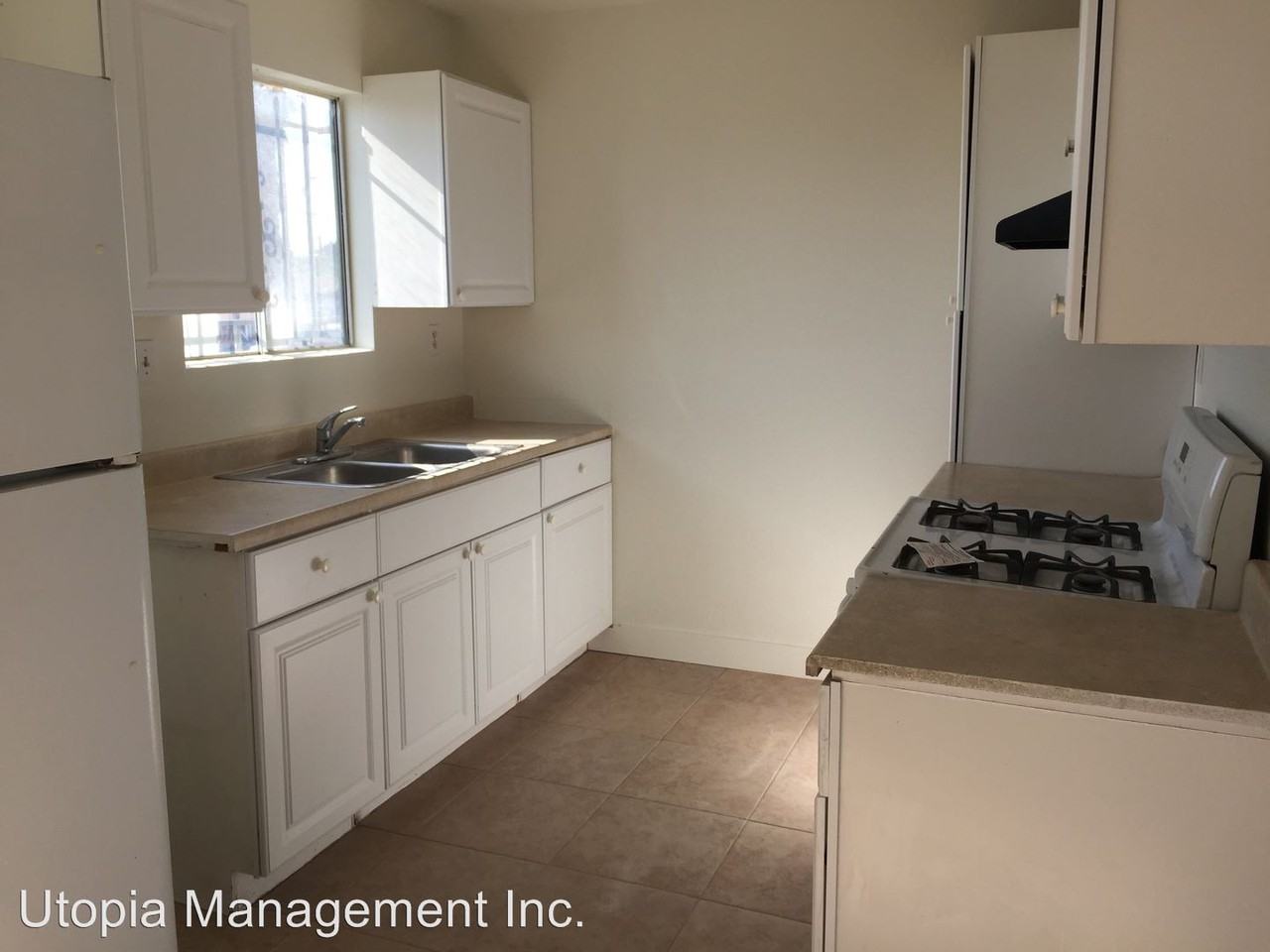 1407 - 1411 E 7th St - Photo 3 of 9