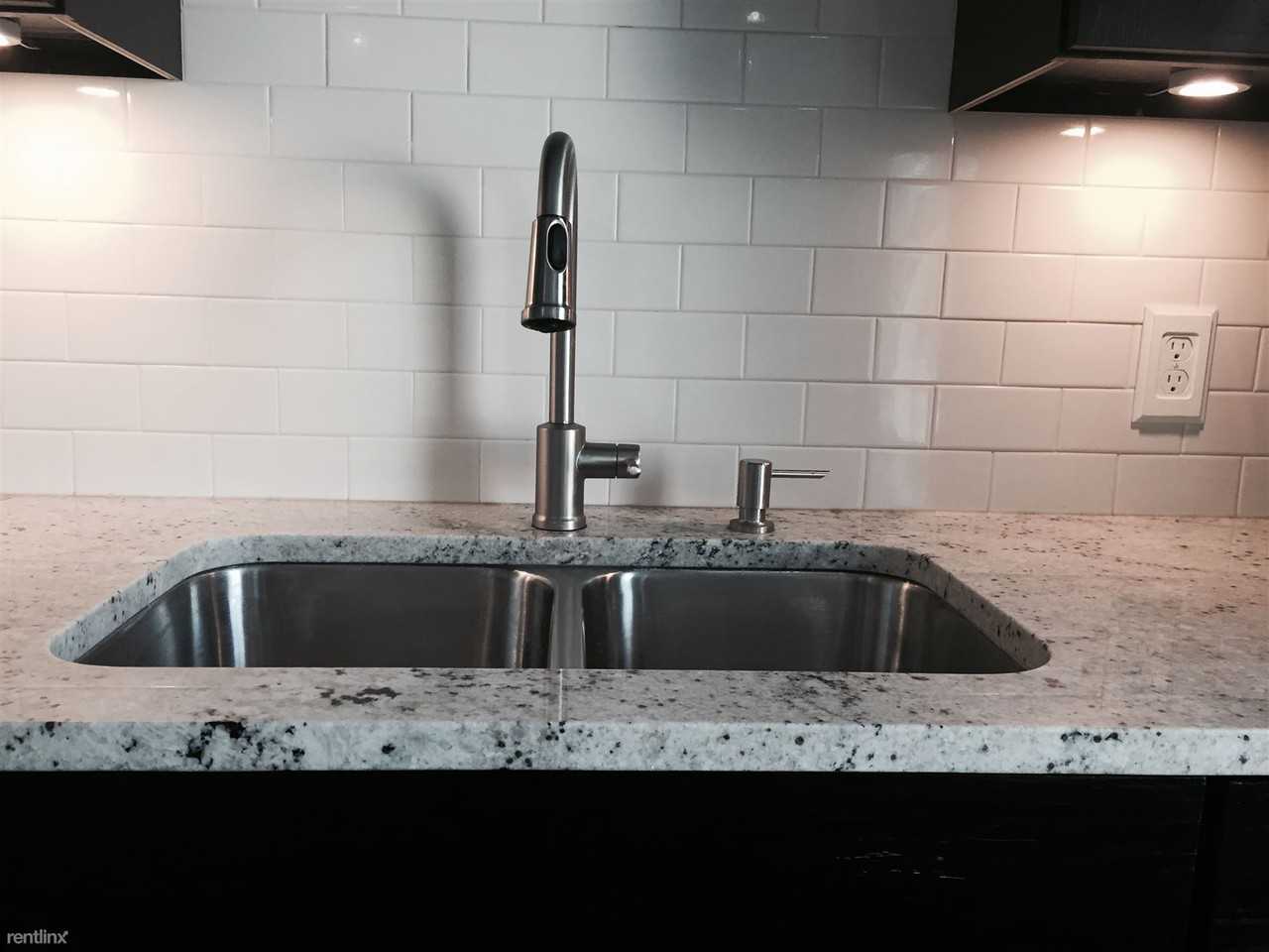 East Village Apartments - Photo 3 of 8