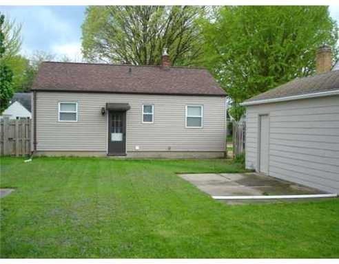 1410 Poxson Ave - Photo 3 of 14