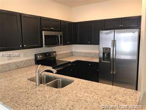 10348 W 33rd Ln - Photo 3 of 8