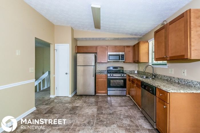 1306 Muirforest Dr - Photo 3 of 13