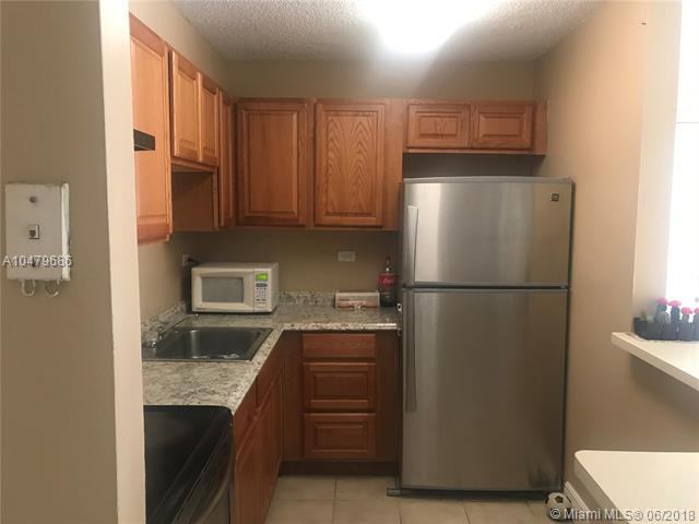 7080 NW 179th St #103 - Photo 2 of 15