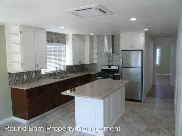 215 W 3rd St - Photo 2 of 6