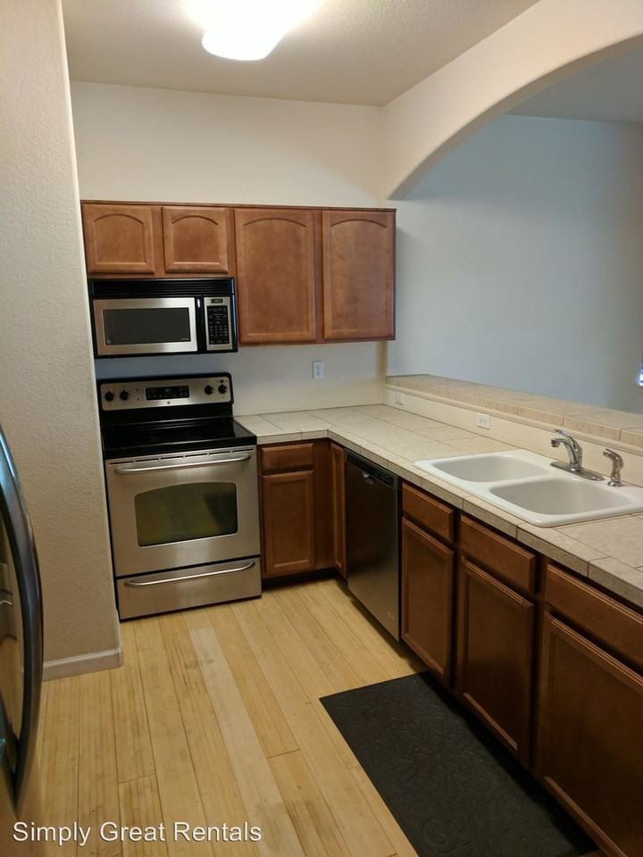 1385 S Chambers Rd #104 - Photo 2 of 17