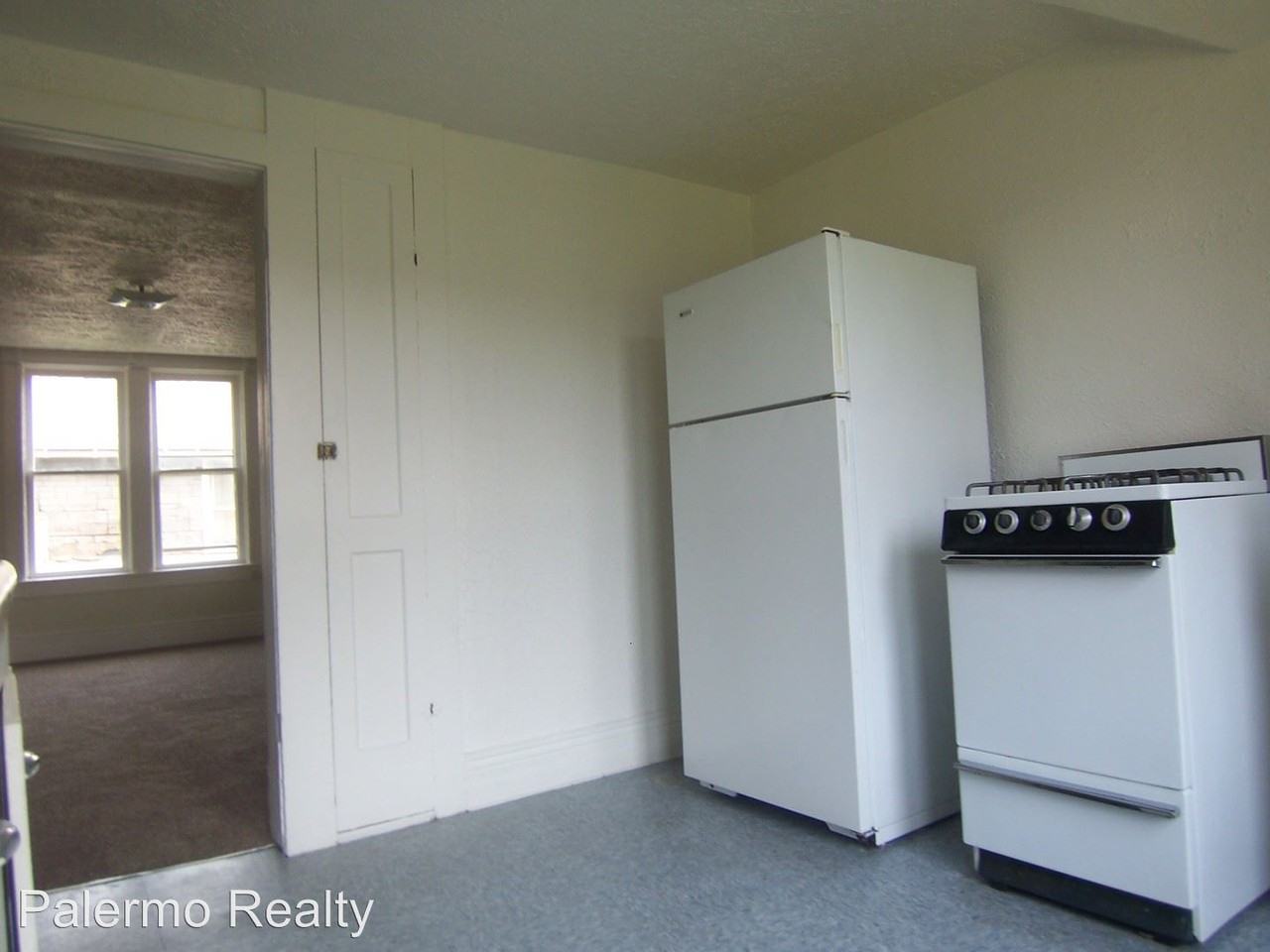 814 E 10TH ST - Photo 2 of 6