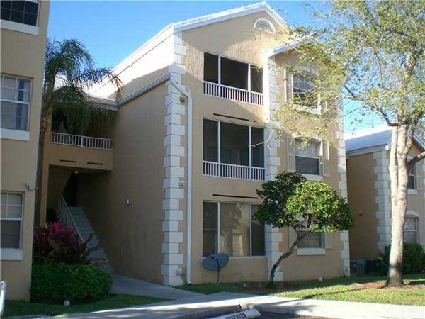 2890 N OAKLAND FOREST DR - Photo 2 of 3