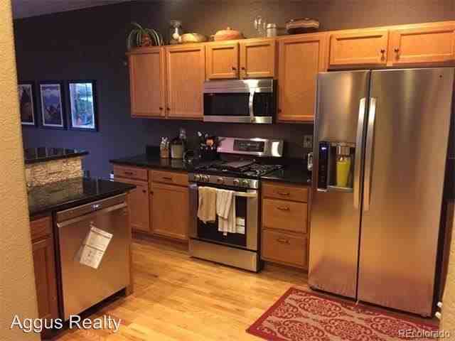 13504 W 63rd Pl - Photo 3 of 25