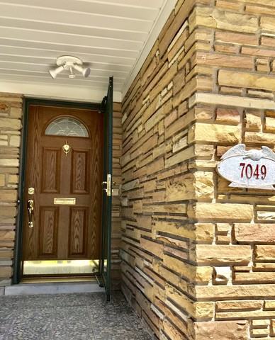 7049 N Caldwell Ave - Photo 2 of 24