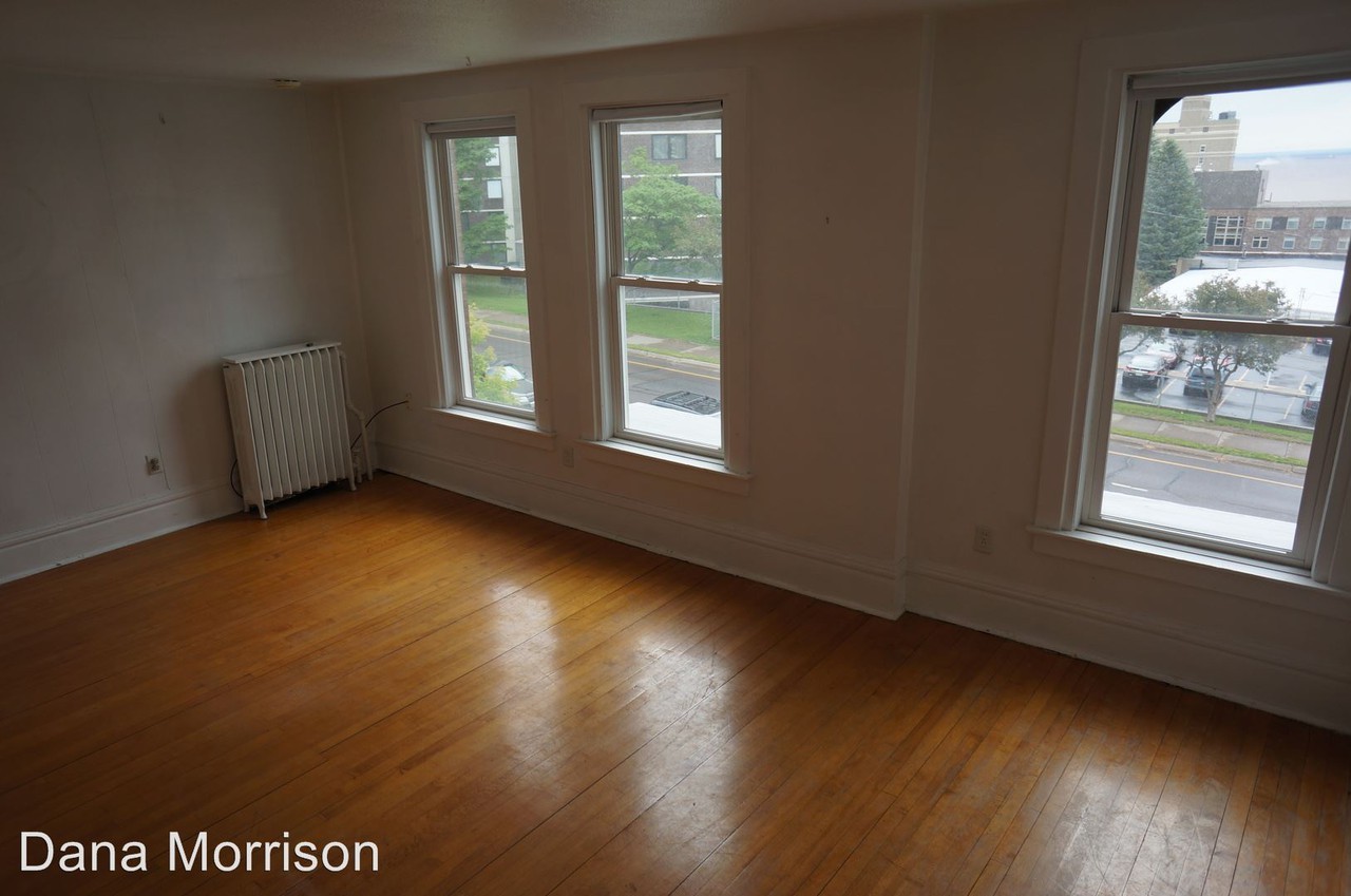 209-211 E 3rd St - Photo 2 of 8