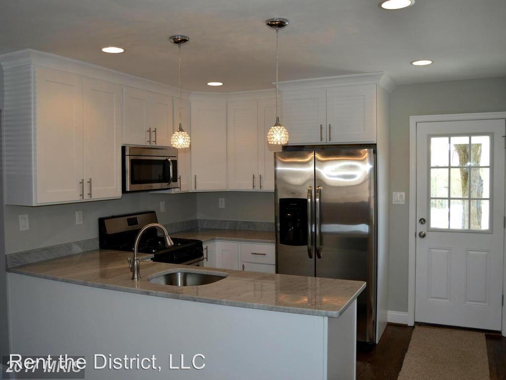 707 Kennedy St NE - Photo 2 of 14