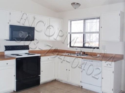 14279 E 51st Ave - Photo 2 of 4