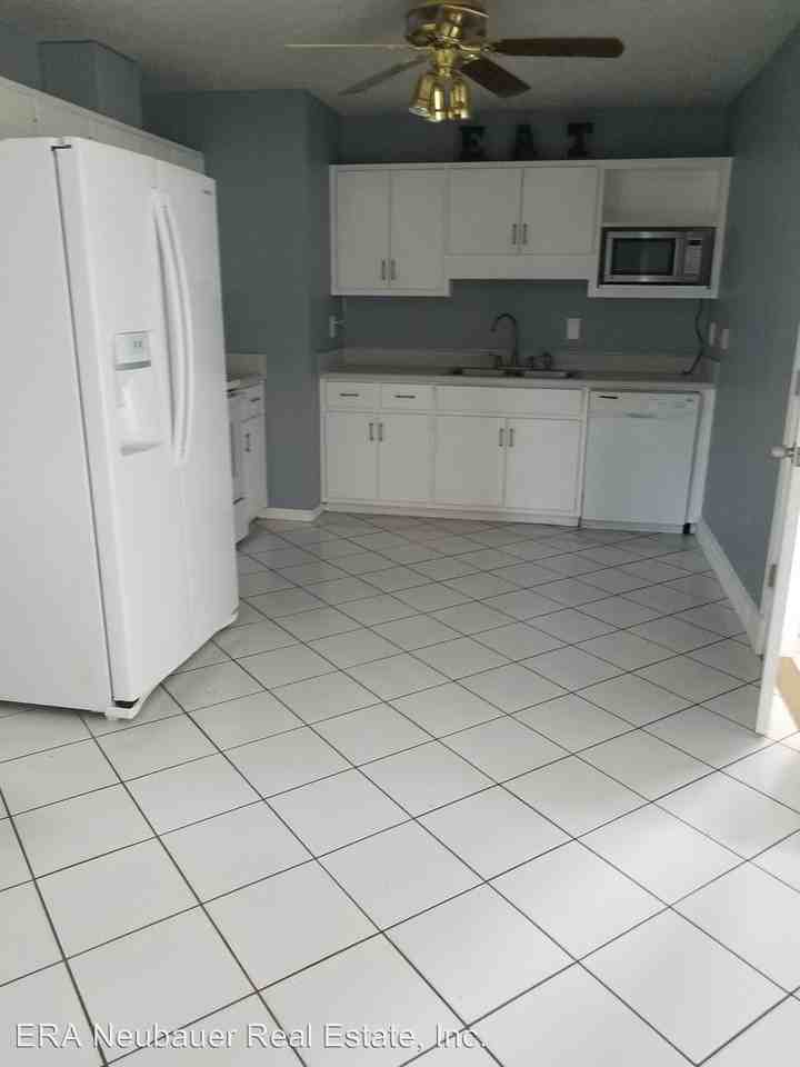 8242 Campflowers Rd - Photo 3 of 4