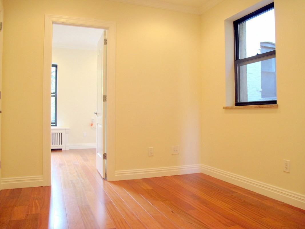 East 62nd St - Photo 2 of 7