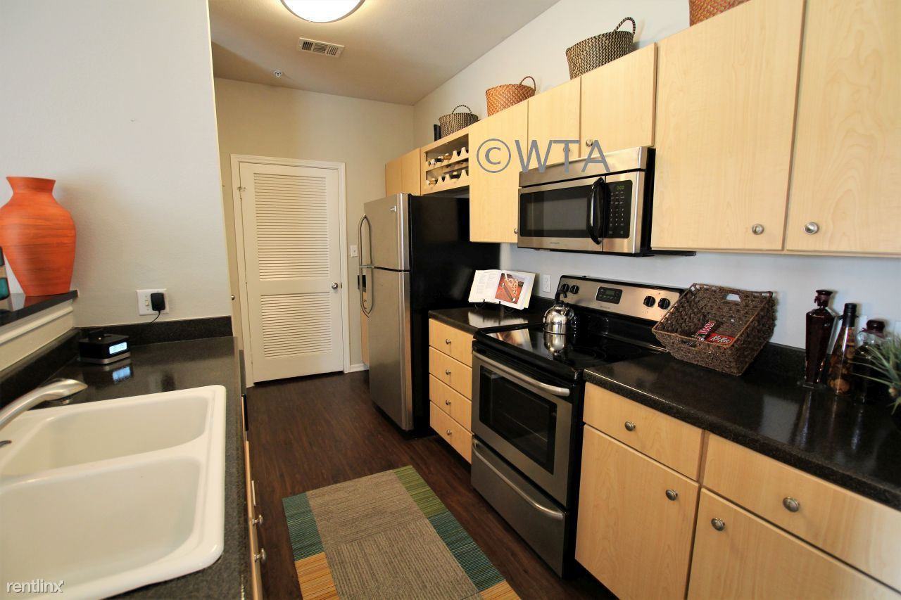 8700 BRODIE LN - Photo 2 of 20