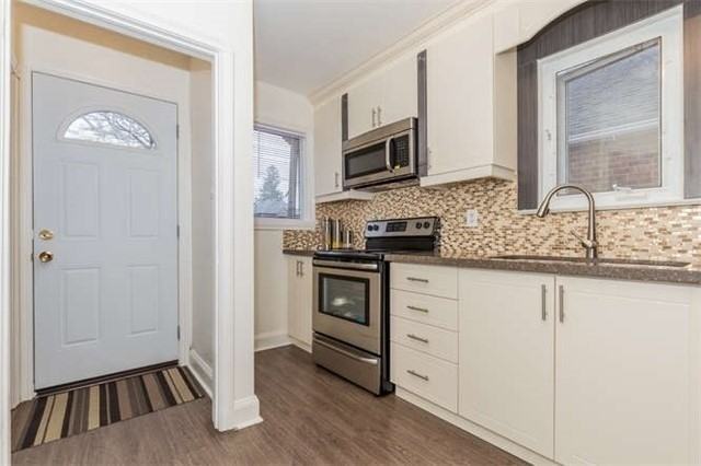 2421 Gerrard St E - Photo 2 of 14