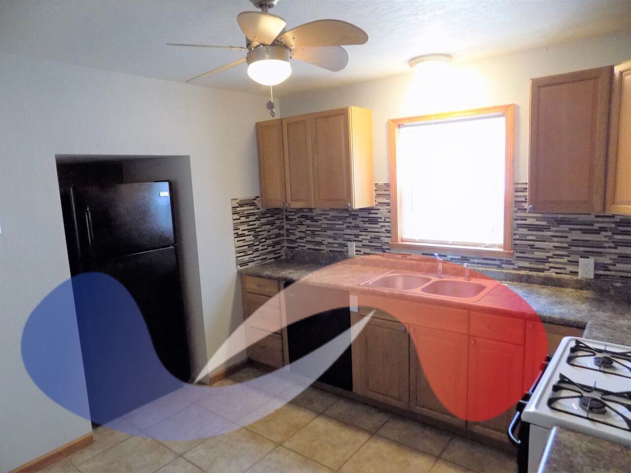 6715 E 58 St - Photo 3 of 8