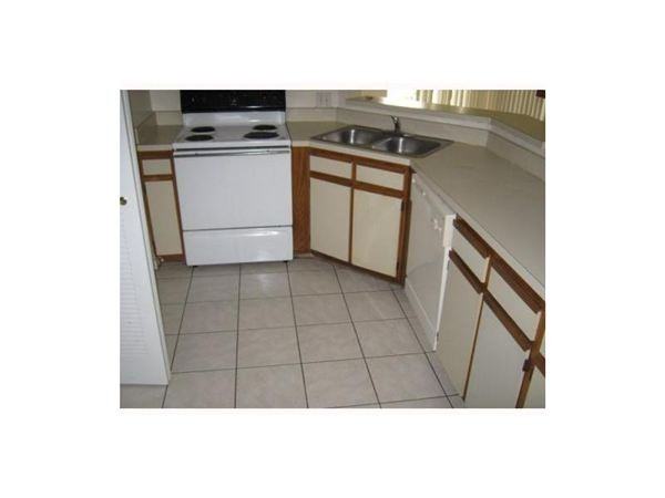 3449 NW 44TH ST - Photo 3 of 5