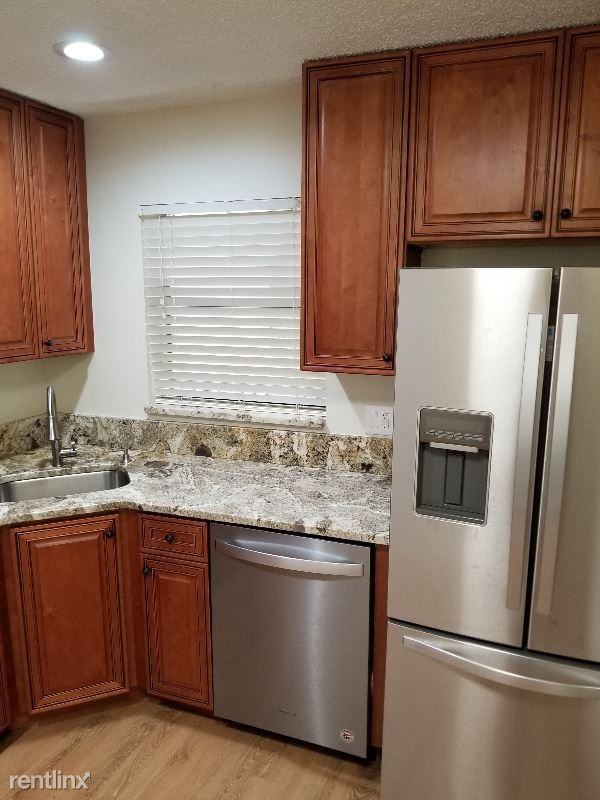 3901 Cocoplum Cir - Photo 2 of 8