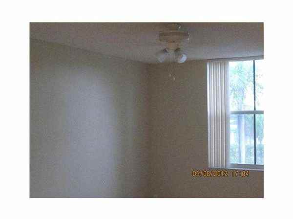 1341 SE 3RD AV - Photo 3 of 11