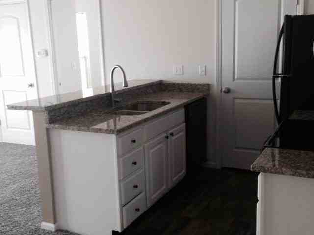 9002 W 64th Ter - Photo 2 of 15