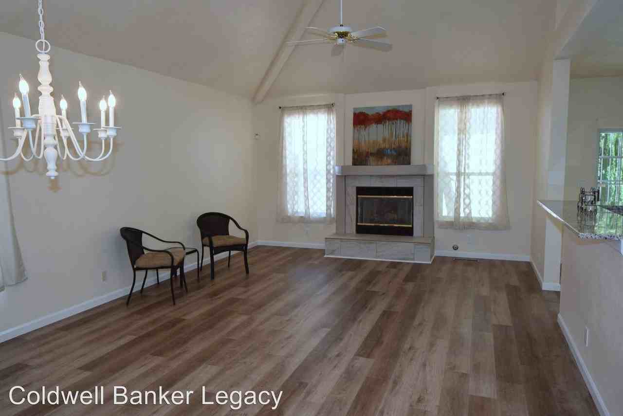 11921 Oryx Pl NE - Photo 2 of 18