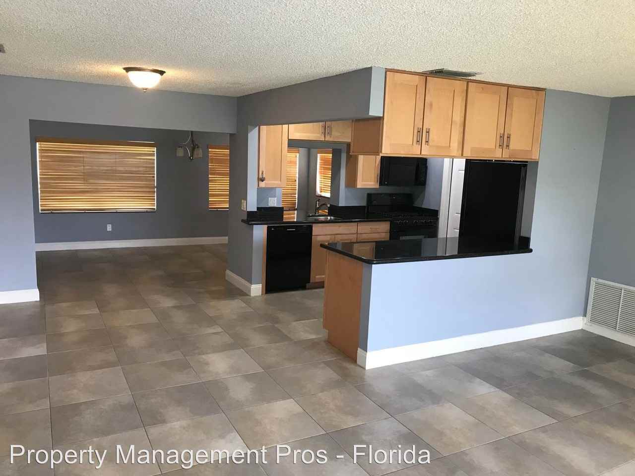 8980 NW 26th Pl - Photo 2 of 11