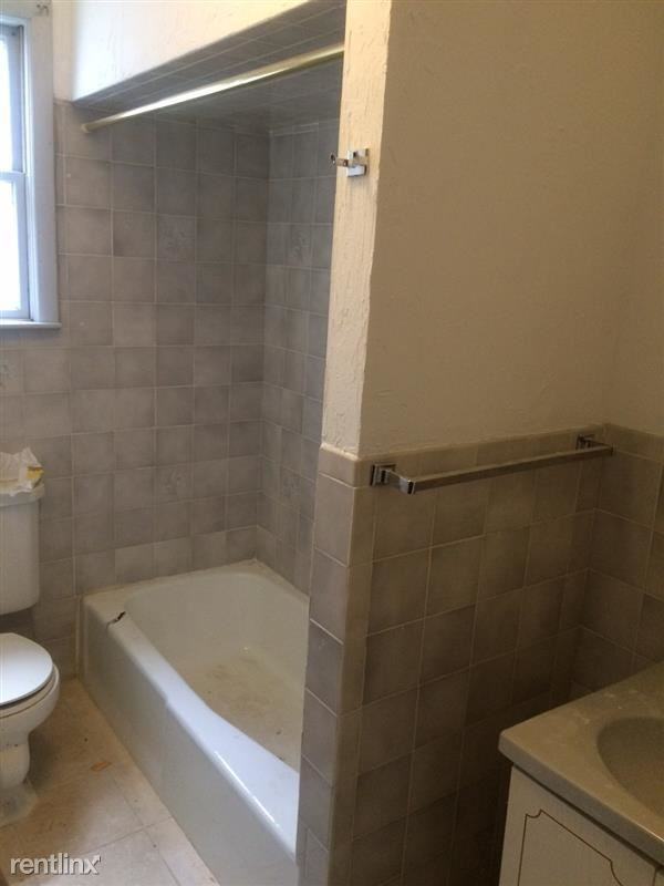 100 Sycamore St - Photo 3 of 4