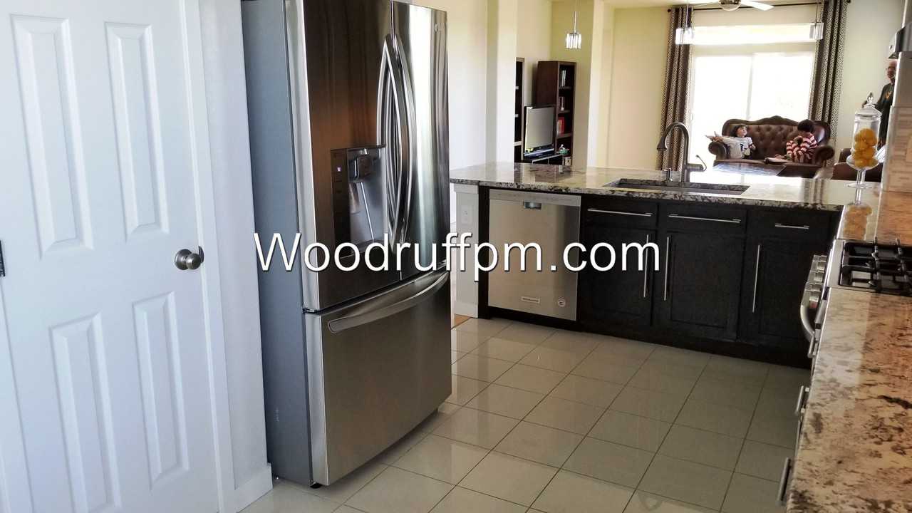 14458 West 91st Avenue - Photo 3 of 32