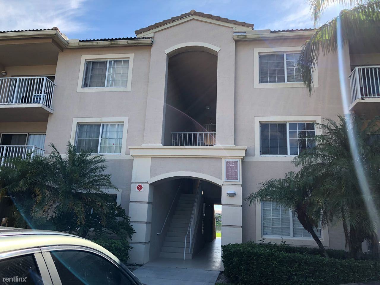 5021 Wiles Rd - Photo 2 of 9