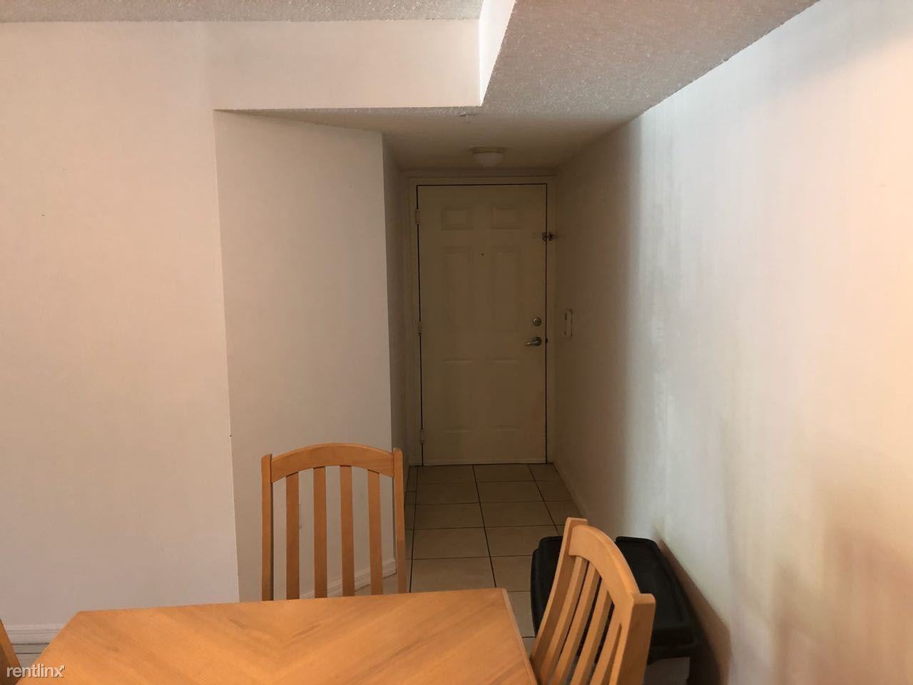 5021 Wiles Rd - Photo 3 of 9