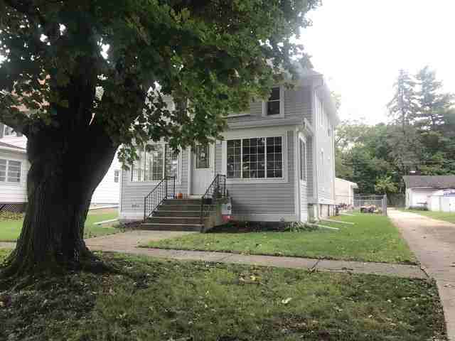 310 S Genoa St - Photo 2 of 4