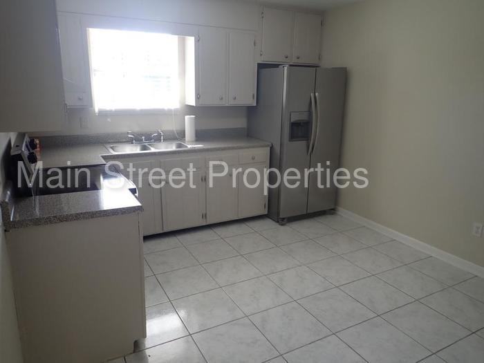 5128 Teakwood Dr - Photo 2 of 14