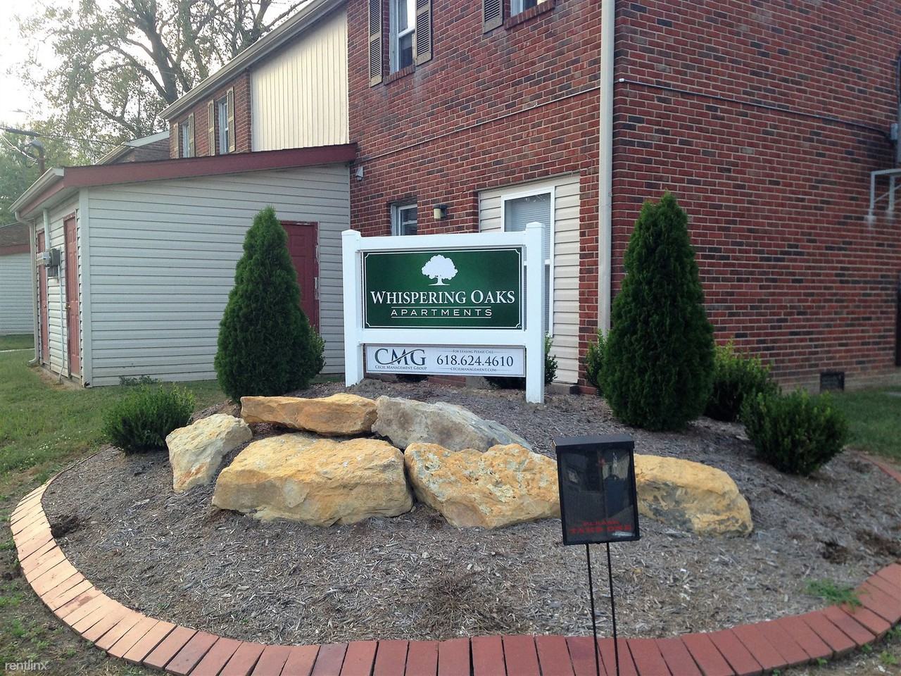 Whispering Oaks Apartments - Photo 2 of 14