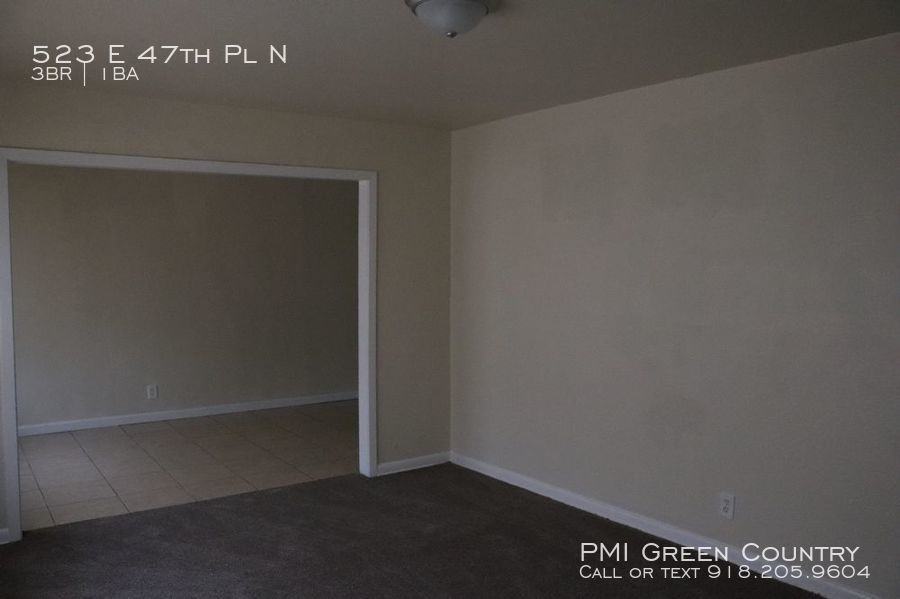 523 E 47th Pl N - Photo 3 of 18