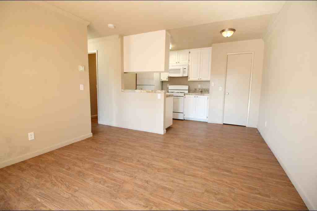 PARKSIDE APARTMENTS - Photo 3 of 5