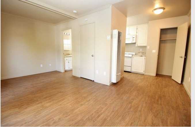 PARKSIDE APARTMENTS - Photo 4 of 5