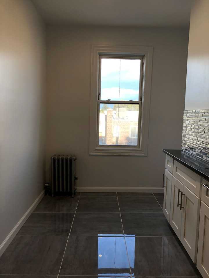 71-11 71st St - Photo 3 of 6