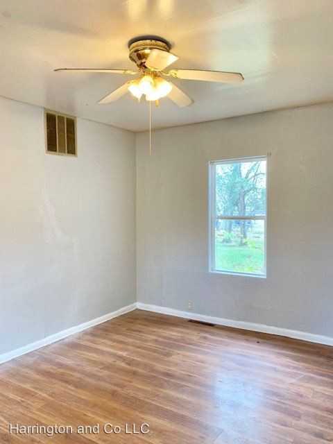 415 E 3rd St - Photo 2 of 5