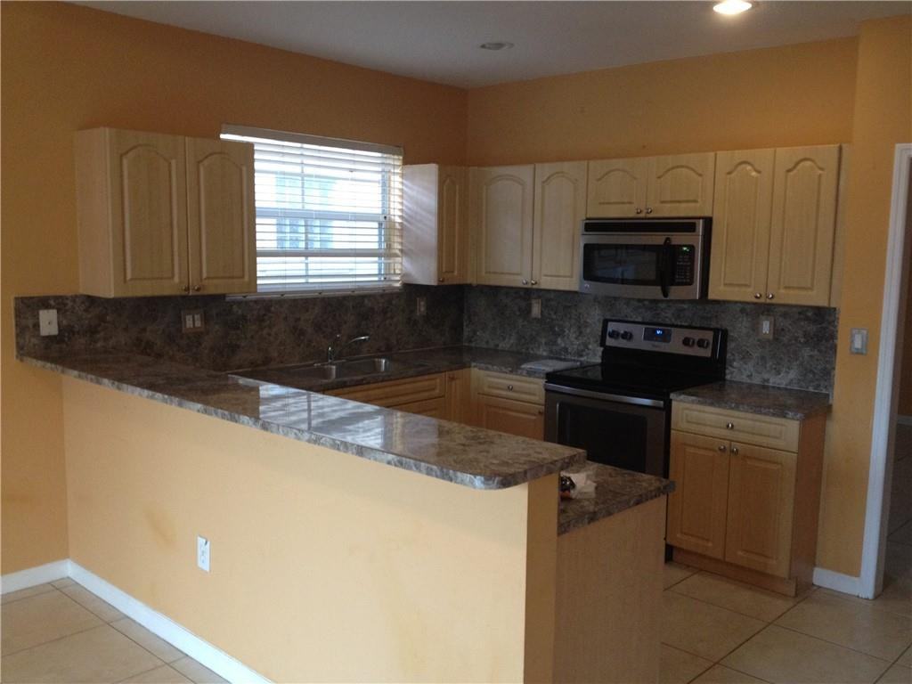 12127 Northwest 47th Manor - Photo 3 of 6
