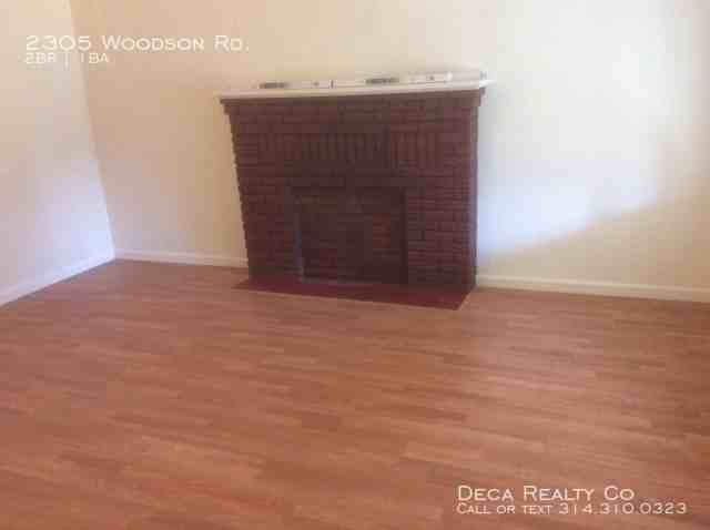 2305 Woodson Rd - Photo 2 of 9