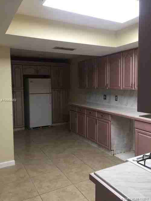 9061 NW 25th Ct - Photo 3 of 8