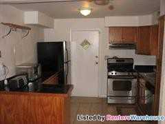 9911 Grayson Ave - Photo 3 of 7