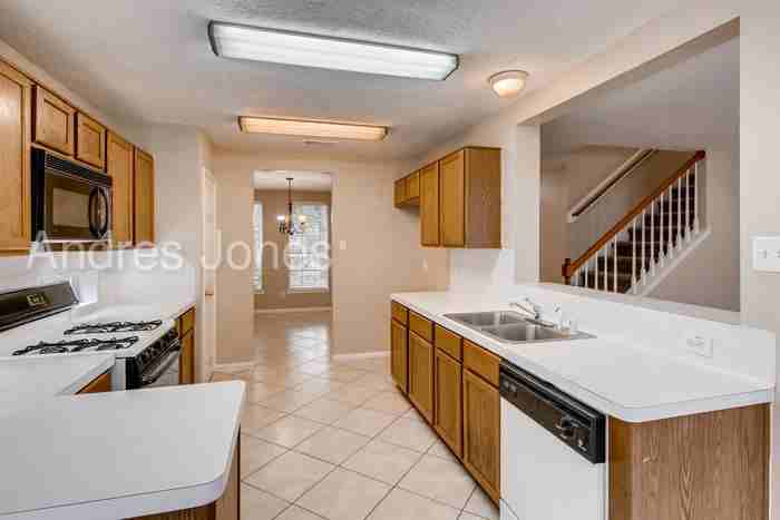 6910 Cobblestone Path - Photo 2 of 16