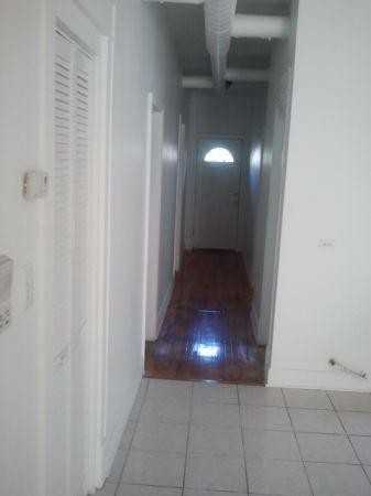 8257 S Coles Ave - Photo 3 of 7