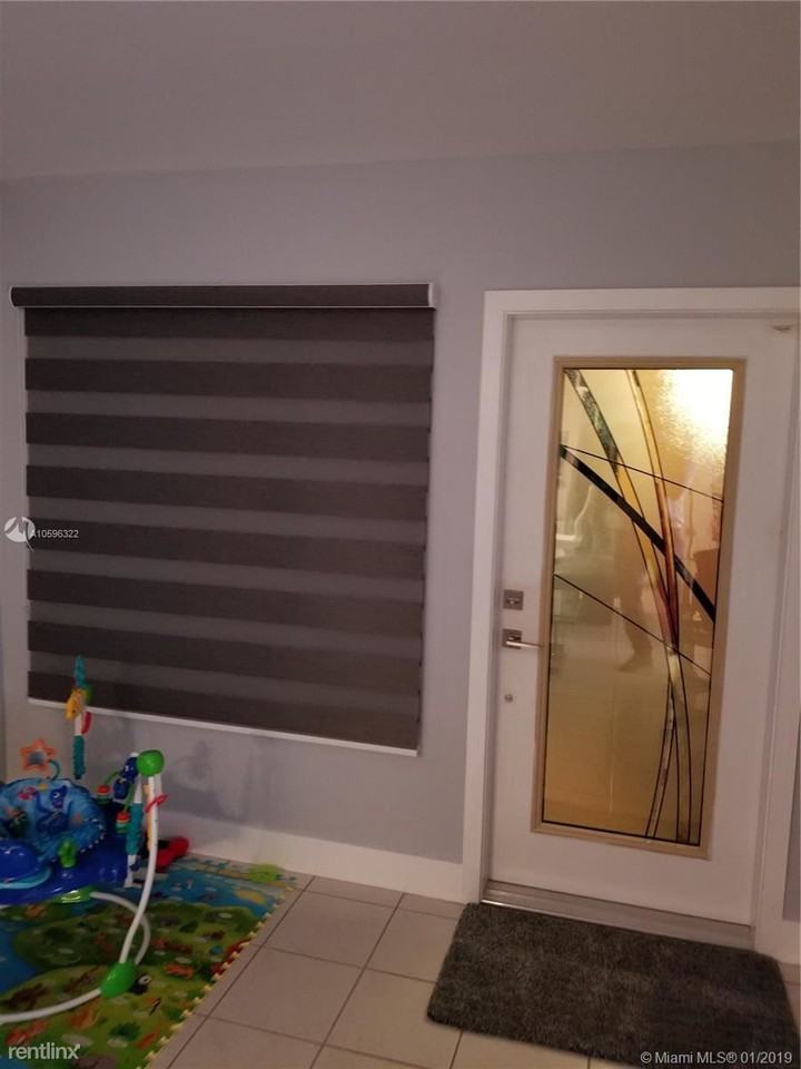 8391 SW 148th Ave - Photo 2 of 19