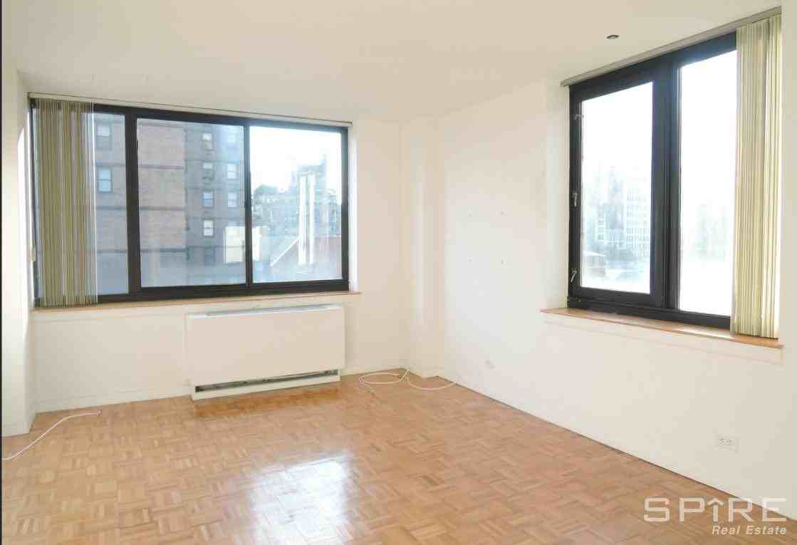 E 30th St - Photo 2 of 6