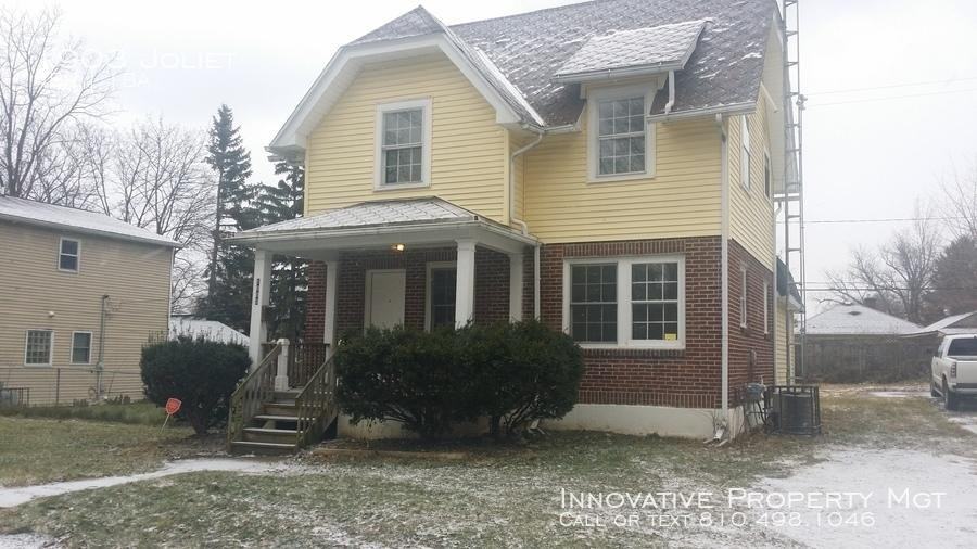 1903 Joliet St - Photo 2 of 13